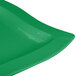 A green cast aluminum rectangular platter with curved corners.