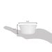 A hand holding a white fluted Carlisle melamine ramekin.