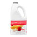 A white plastic jug of Torani Strawberry Banana Fruit Smoothie Mix with a red label.