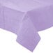 A Creative Converting Luscious Lavender purple table cover on a table.