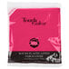 A plastic package with a pink Creative Converting tablecloth inside.