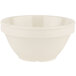 A white melamine bowl with a diamond pattern on the rim.