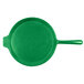 A close up of a green Tablecraft pizza pan with a handle.