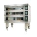 A Doyon artisan bakery deck oven with wheels.