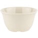 A GET Diamond Ivory melamine bowl with a curved edge on a white background.