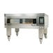 A Doyon Artisan stone deck oven with a glass door and wheels.