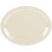 A white oval platter with a diamond ivory rim.