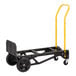 A black and yellow Harper hand truck with rubber wheels.