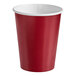 A red Creative Converting paper cup.