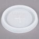 A white plastic Cambro lid with a straw slot.