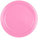 A close-up of a Creative Converting candy pink paper plate.