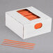 A white box of Bedford Industries Inc. orange laminated bag twist ties.