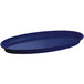 A blue oval cast aluminum platter with a speckled surface and a handle.