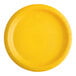 A close-up of a Creative Converting School Bus Yellow paper plate.