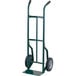 A green metal Harper hand truck with black wheels.