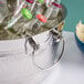 An American Metalcraft double wall party tub filled with soda bottles on a table.