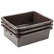 A stack of Rubbermaid brown high density polyethylene bus tubs.