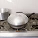 a silver pan on a stove