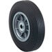 A black wheel with a silver rim and a black tire on a Harper hand truck.