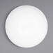 A white melamine bowl with a circular sunburst design.