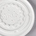 a white plastic lid with text