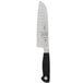 A Mercer Culinary Genesis Santoku Knife with a black handle and a white blade.