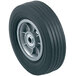 A close-up of a black wheel with a white rim and black spokes on a Harper hand truck.