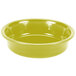A yellow Fiesta china bowl on a white background.