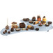 A Tablecraft gray cast aluminum two tiered platter with chocolate desserts displayed on it.