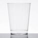 A clear plastic Fineline Renaissance tumbler on a white surface.