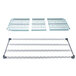 A white MetroMax Q metal shelf grid with black squares.