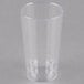 A clear plastic Fineline Renaissance tumbler on a gray surface.