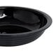 A black Cambro round ribbed bowl.