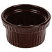 A brown Tablecraft cast aluminum souffle bowl with ridges on the sides.