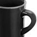 A close-up of a black CAC Venice Hartford mug with a handle.