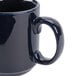 A cobalt blue CAC Venice stacking mug with a handle.