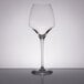 A close-up of a clear Chef & Sommelier wine glass.