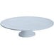A gray cast aluminum Tablecraft cake stand with a pedestal.