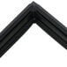A black magnetic door gasket for a True refrigerator with white backing.