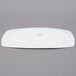 A Tuxton porcelain white rectangular china platter on a white background.