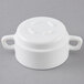 A white double handled bowl by Arc Cardinal.