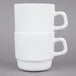 A stack of white Arcoroc tall cups with a white handle on top.