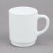 An Arcoroc white stacking mug with a handle.