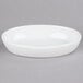 A Tuxton porcelain white oval baker dish.