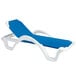 A white and blue Grosfillex chaise lounge chair with a white sling.