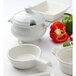 A white Tuxton French casserole bowl with a lid.