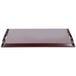 A rectangular mahogany plastic room service tray with handles.