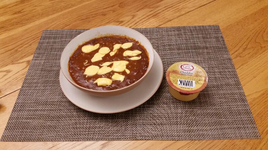 Muy Fresco 3.8 oz. Microwavable Cheddar Cheese Sauce Cup 30/Case