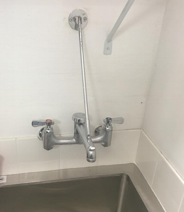 Regency Wall Mounted Mop Sink Faucet with 6 1/2" Swing Spout, 8