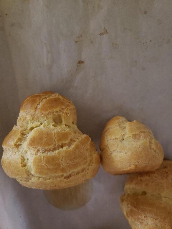 Baker's Mark 12" x 16" Half Size Quilon® Coated Parchment Paper Bun / Sheet Pan Liner Sheet